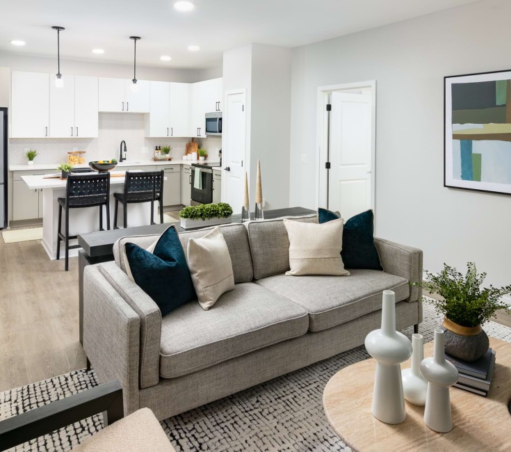 living area sofa wall art kitchen island fridge pendant lights
